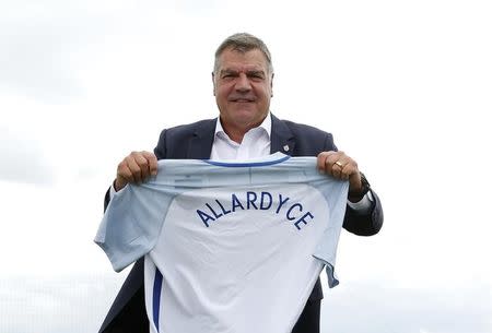 Britain Football Soccer - England - Sam Allardyce Press Conference - Hilton Hotel, St. George?s Park, Burton upon Trent, Staffordshire - 25/7/16 England manager Sam Allardyce poses after the press conference Action Images via Reuters / Andrew Couldridge Livepic