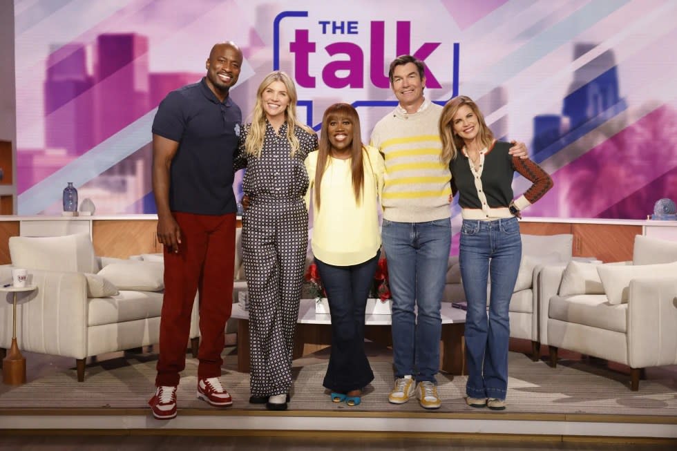 From left: Hosts of the CBS talk show “The Talk” Akbar Gbajabiamila, Amanda Kloots, Sheryl Underwood, Jerry O’Connell and Natalie Morales pose for a photo for the season 14 premiere which aired Feb. 23, 2023. (Sonja Flemming /CBS via AP)