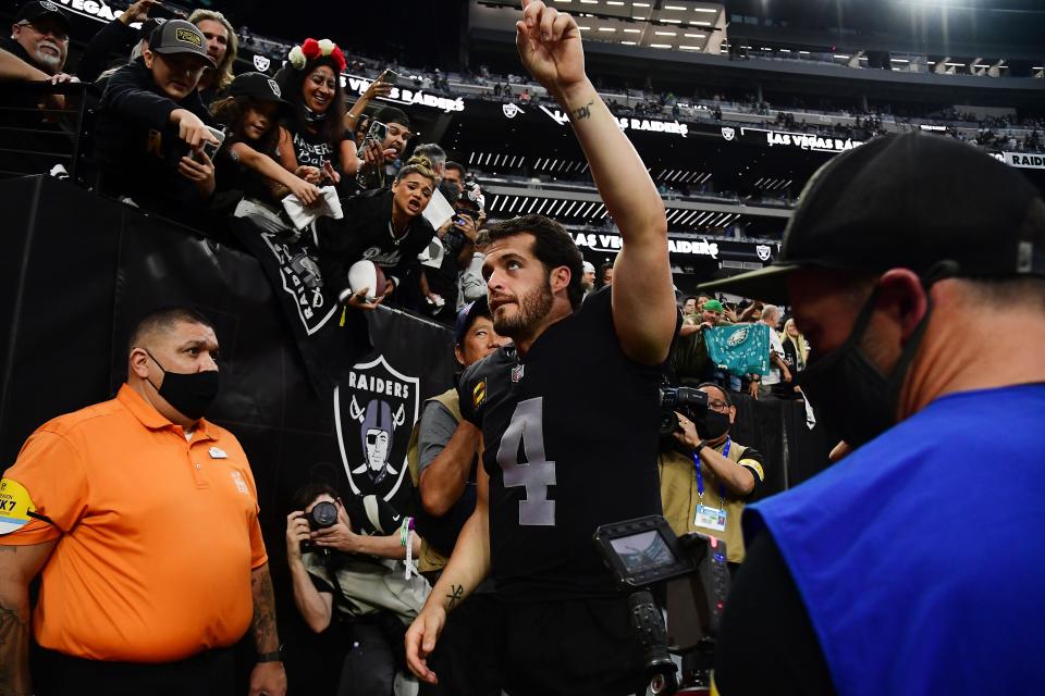 Las Vegas Raiders quarterback Derek Carr (4) celebrates the 33-22 victory against the Philadelphia Eagles at Allegiant Stadium.