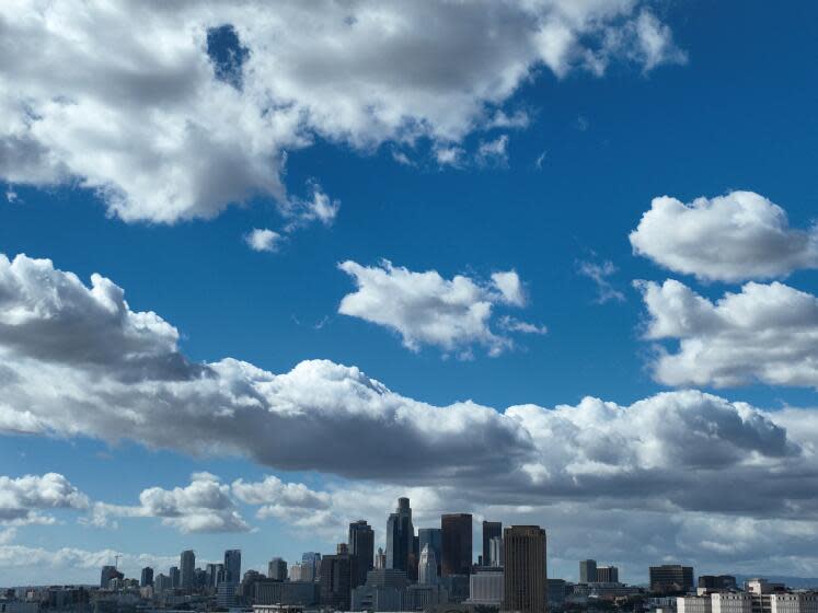 Boyle Heights, CA - February 08: A view of partially-cloudy skies with a view of the downtown Los Angeles skyline following several days of atmospheric river storms as seen from Boyle Heights Thursday, Feb. 8, 2024. (Allen J. Schaben / Los Angeles Times)