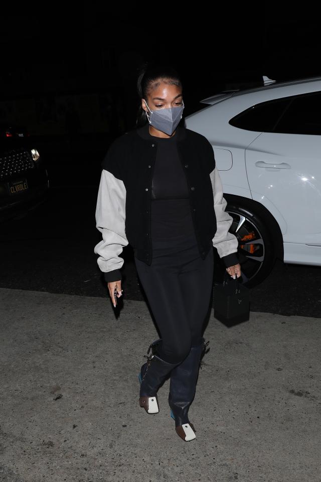 Lori Harvey Steps Out in Leggings & Fierce Louis Vuitton Boots That Are  Inspired by a Biker Jacket