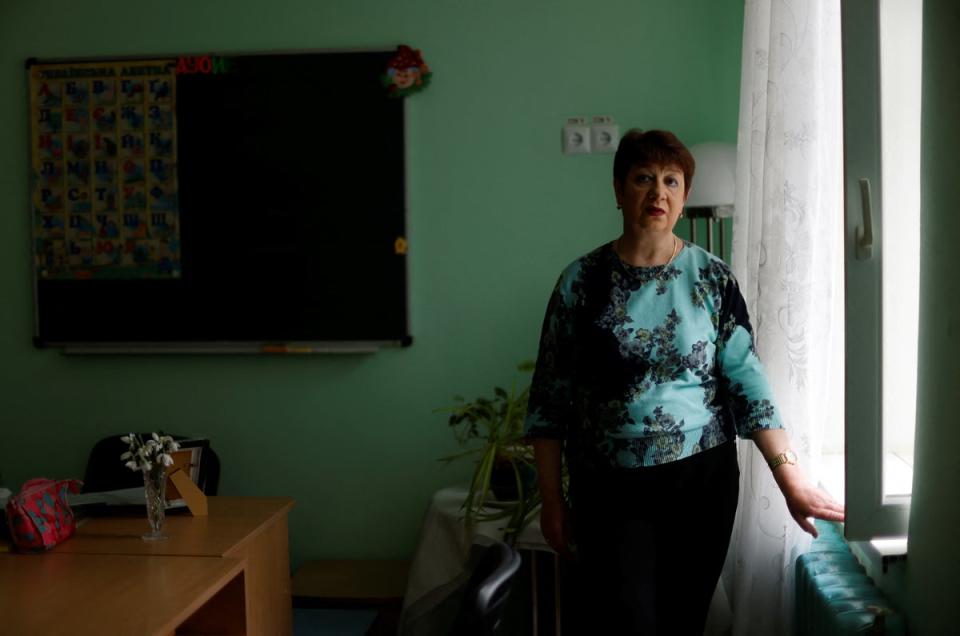 Teacher Irina Nikolaeva Ogurtsova poses for a photo (Reuters)