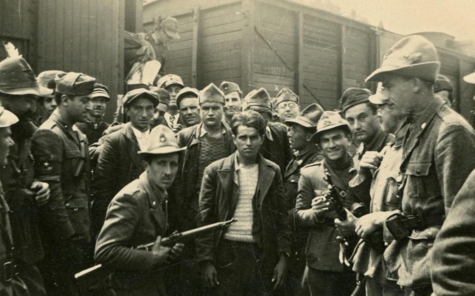 Italian soldiers with captured partisans in Yugoslavia in 1942 - Getty