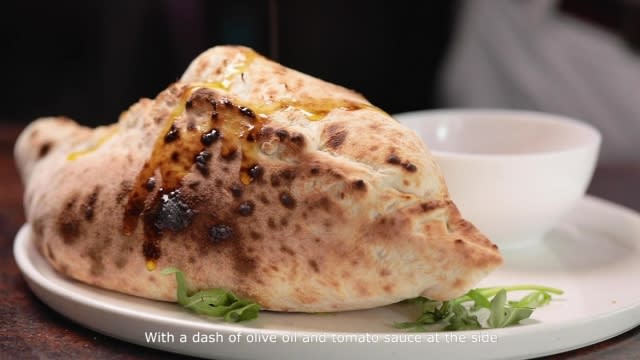 Calzone similar to singapore's curry puff but a big one