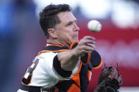 San Francisco Giants catcher Buster Posey throws to first base for the out on a grounder hit by Los Angeles Angels' Jared Walsh during the second inning of a baseball game Tuesday, June 1, 2021, in San Francisco. (AP Photo/Tony Avelar)