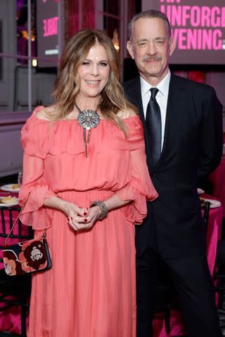 <p>Stefanie Keenan/Getty</p> Rita Wilson and Tom Hanks pose for a photo at the 25th 'An Unforgettable Evening' gala