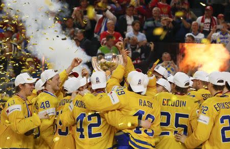 Ice Hockey - 2017 IIHF World Championship - Gold medal game - Canada v Sweden - Cologne, Germany - 22/5/17 - Players of Sweden celebrate their victory. REUTERS/Grigory Dukor