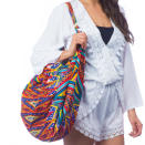 <p>Show off your true colors (literally) with this vibrant beach bag that features a roomy interior and a zip closure.</p> <p><strong>To buy: </strong><a rel="nofollow noopener" href="https://www.lablancaswim.com/color-me-happy-canvas-sling-bag" target="_blank" data-ylk="slk:lablancaswim.com;elm:context_link;itc:0;sec:content-canvas" class="link ">lablancaswim.com</a>, $89</p> <p><em>This article originally appeared on <a rel="nofollow noopener" href="http://www.travelandleisure.com/" target="_blank" data-ylk="slk:Travelandleisure.com;elm:context_link;itc:0;sec:content-canvas" class="link ">Travelandleisure.com</a>. To see the rest of the bags, <a rel="nofollow noopener" href="http://www.travelandleisure.com/style/travel-bags/beach-travel-bags" target="_blank" data-ylk="slk:click here;elm:context_link;itc:0;sec:content-canvas" class="link ">click here</a>.</em></p>