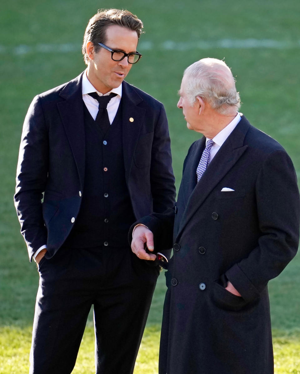 King Charles III talks to Ryan Reynolds at Wrexham AFC on December 09, 2022 in Wrexham, Wales. (Christopher Furlong / Getty Images)