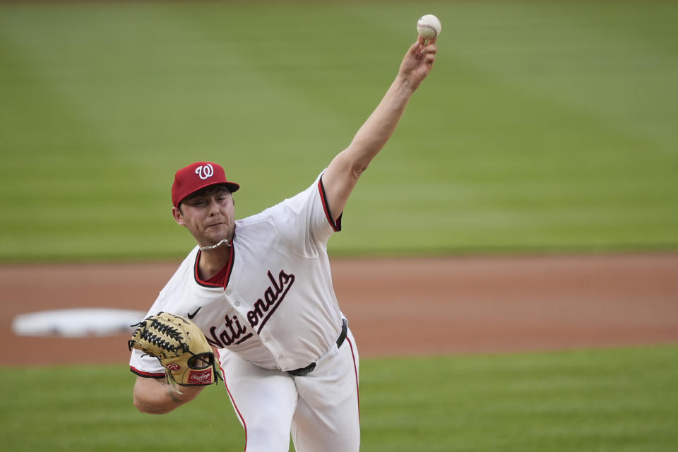 Washington Nationals pitcher Mitchell Parker throws during the first inning of the team's baseball game against the Baltimore Orioles at Nationals Park in Washington, Wednesday, May 8, 2024. (AP Photo/Susan Walsh)