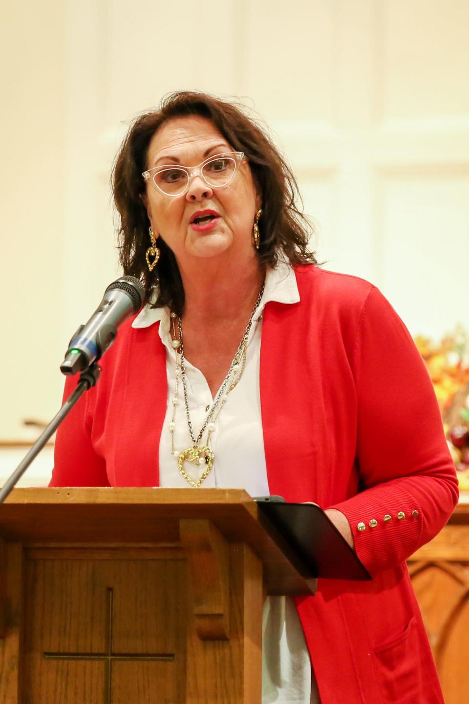 Julie Cook emceed the flag ceremony at the 15th annual Flags of Freedom fundraiser for the Carl Perkins Center for the Prevention of Child Abuse. The event was hosted by the Jackson Exchange Club and held at the First Cumberland Presbyterian Church in Jackson, Tenn. November 15, 2022.