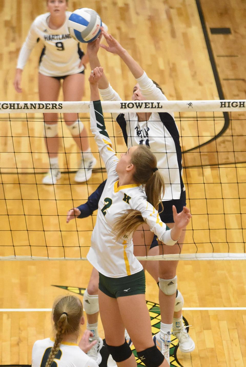 Howell's Chloe Kiser (2) and Hartland's Cameron Herman (11) made the All-Kensington Lakes Activities Association volleyball team.