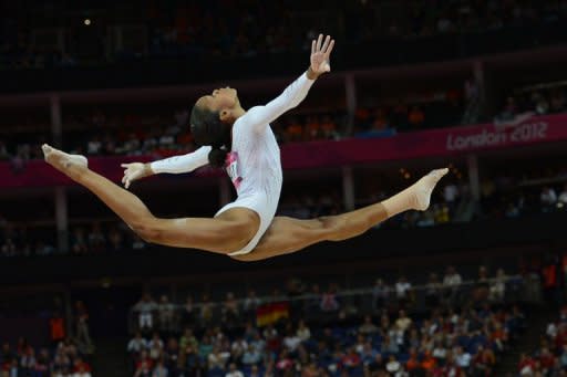 US gymnast Gabrielle Douglas performs during the women' s beam final of the artistic gymnastics event of the London Olympic Games, on August 7, at the 02 North Greenwich Arena