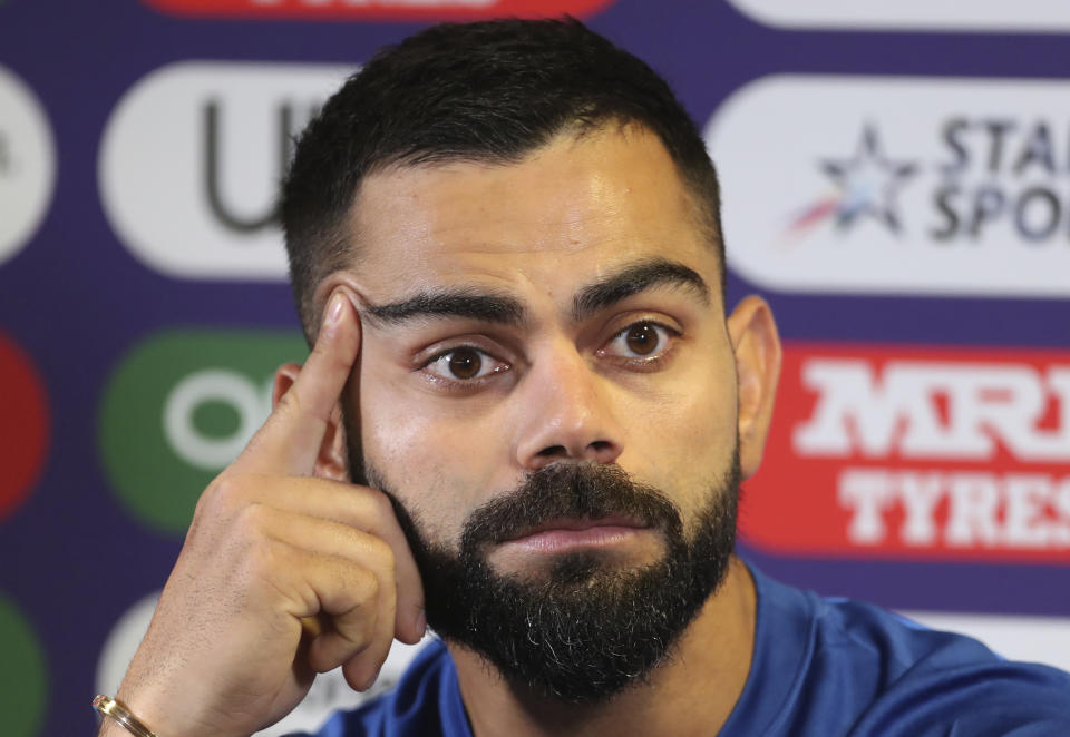 India's captain Virat Kohli listens to a question from a journalist during a press conference ahead of their Cricket World Cup match against England at Edgbaston in Birmingham, England, Saturday, June 29, 2019. (AP Photo/Aijaz Rahi)