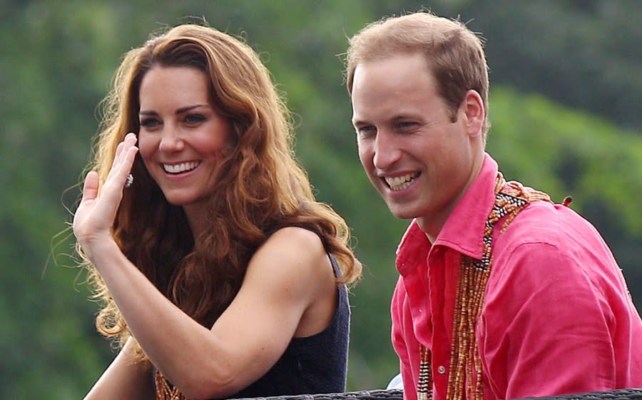 FILE – Britain’s Prince William and his wife Kate, the Duke and Duchess of Cambridge, smile as they watch a shark ceremony as they arrive at Marapa Island, Solomon Islands, Monday, Sept. 17, 2012. (AP Photo/Rick Rycroft, Pool, File)