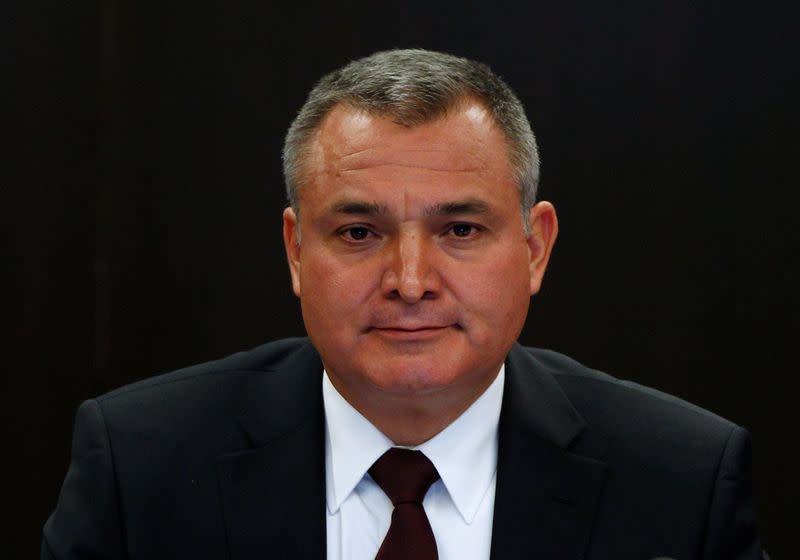 FILE PHOTO: Mexico's Public Security Minister Genaro Garcia Luna attends a meeting with the Human Rights commission at the Senate in Mexico City