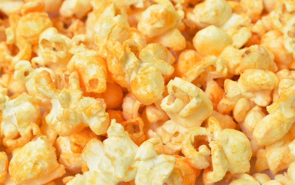 Cheesy popcorn close-up.