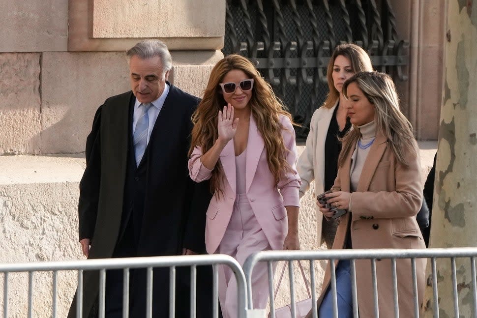 Shakira and legal team