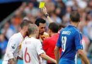 Football Soccer - Italy v Spain - EURO 2016 - Round of 16 - Stade de France, Saint-Denis near Paris, France - 27/6/16 Spain's Sergio Busquets is booked by referee Cuneyt Cakir REUTERS/John Sibley Livepic