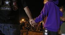 <p>People attend a vigil near where a mass shooting took place at the First Baptist Church in Sutherland Springs, Texas, Nov. 5, 2017. (Photo: Larry W. Smith/EPA-EFE/REX/Shutterstock) </p>