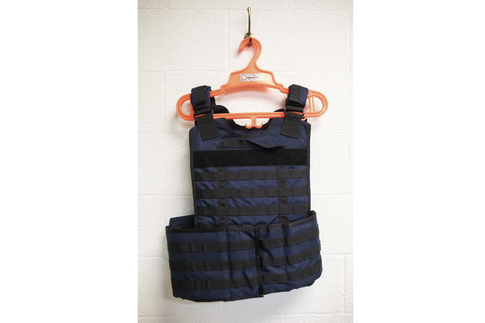 FILE - A bullet proof vest worn by EMT is displayed in Harrisburg, Pa. Jan. 11, 2018. When a shooter attacked a supermarket in Buffalo, New York, May 14, 2022, its security guard tried to stop him. At least one of the guard's shots hit the gunman, but it didn’t stop the deadly rampage because the gunman was wearing body armor. (Sean Simmers/PennLive.com via AP, File)