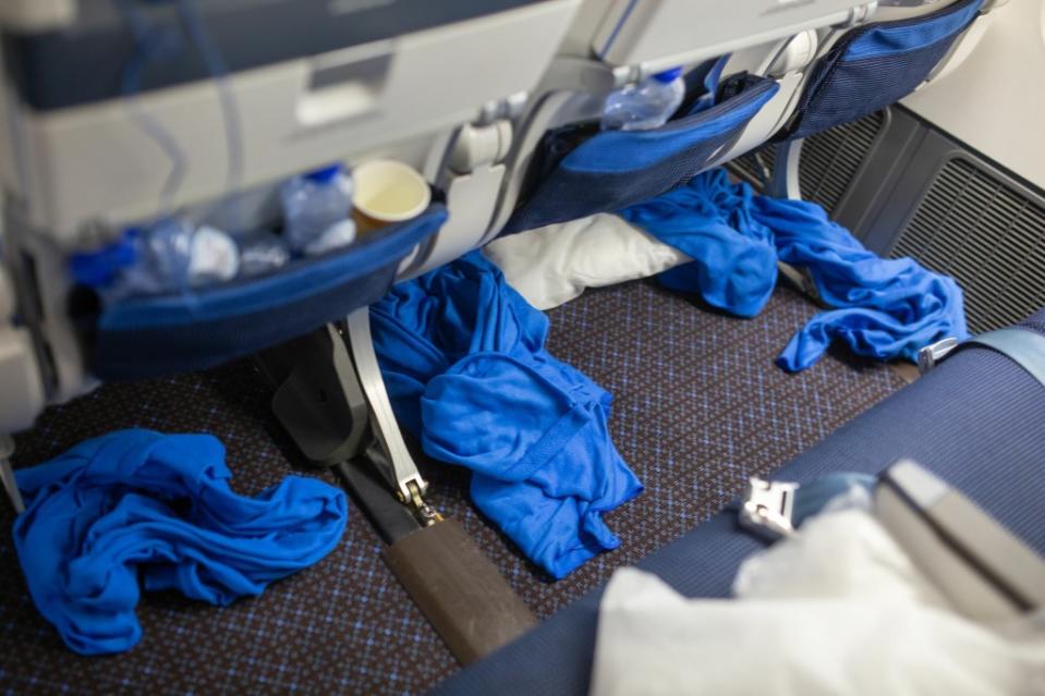 An airplane cleaner says he can tell how filthy a flyer’s home is by the condition of their seat on an aircraft. Wirestock – stock.adobe.com