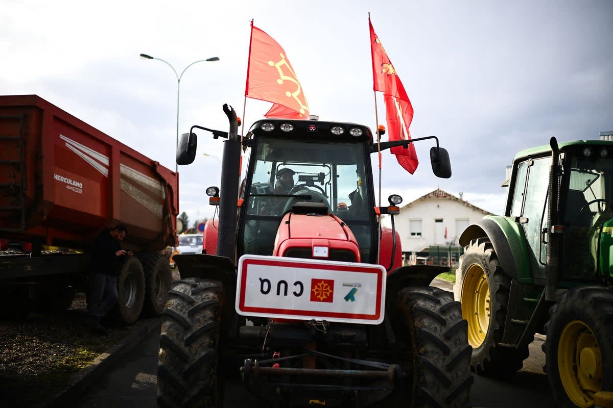 A farmer sits in his truck in Agen, southern France (AFP via Getty Images)