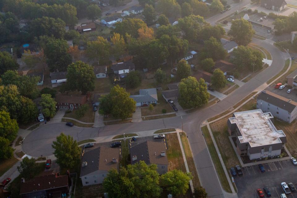 County appraisers have until Friday to mail valuation notices to Kansas property owners, like those of these homes seen from a hot air balloon in west Topeka. Lawmakers have several property tax cut proposals, but none have come to fruition so far this session.