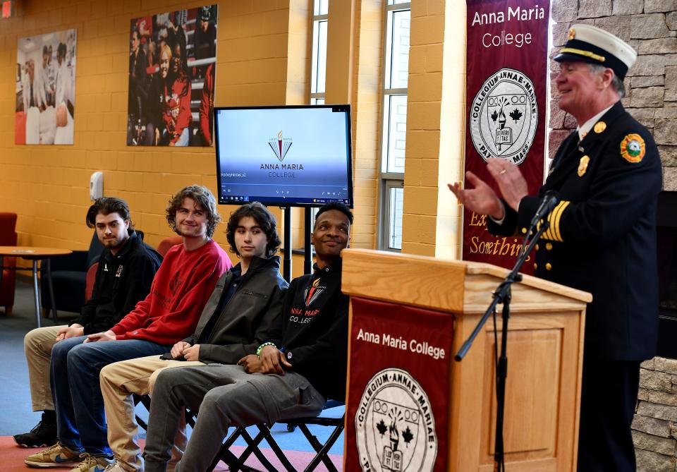 Thomas Bogart, a former fire chief and current professor of fire science at the college, praises the four hockey players at Anna Maria College that helped rescue people from an apartment fire in Philadelphia when they were in town for the Super Bowl.