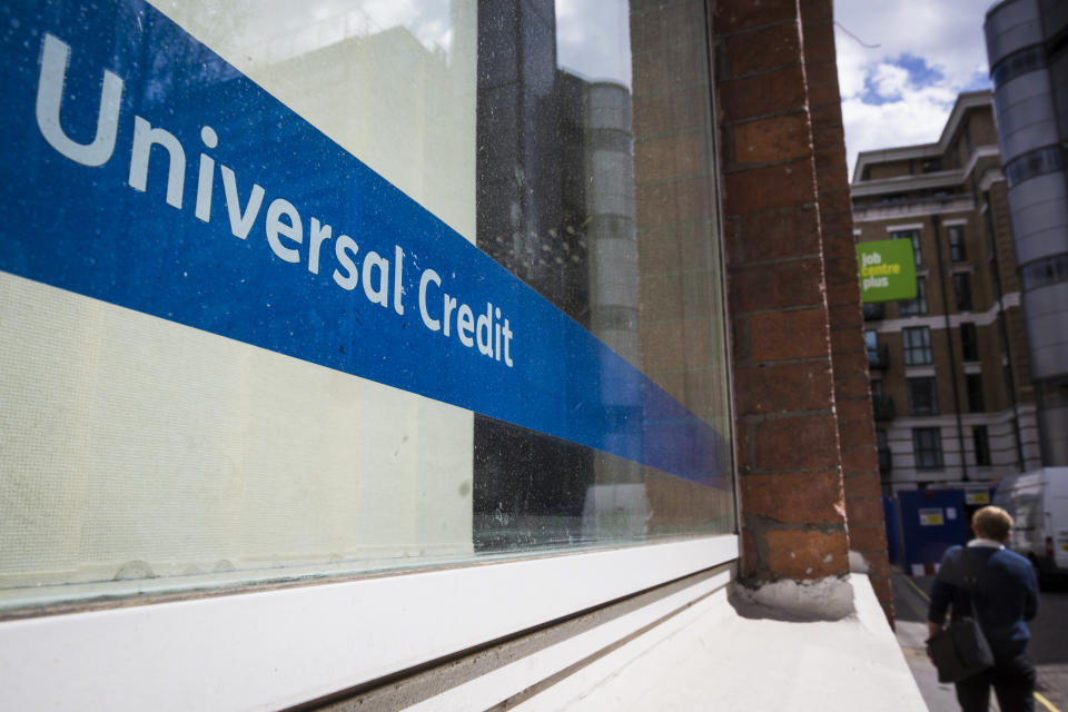 LONDON, ENGLAND - MAY 03: A Universal Credit sign in the window of the Job Centre in Westminster on May 3, 2016 in London, England. The Resolution Foundation, chaired by former Conservative Minister David Willets, has said the Government's benefit reform has 