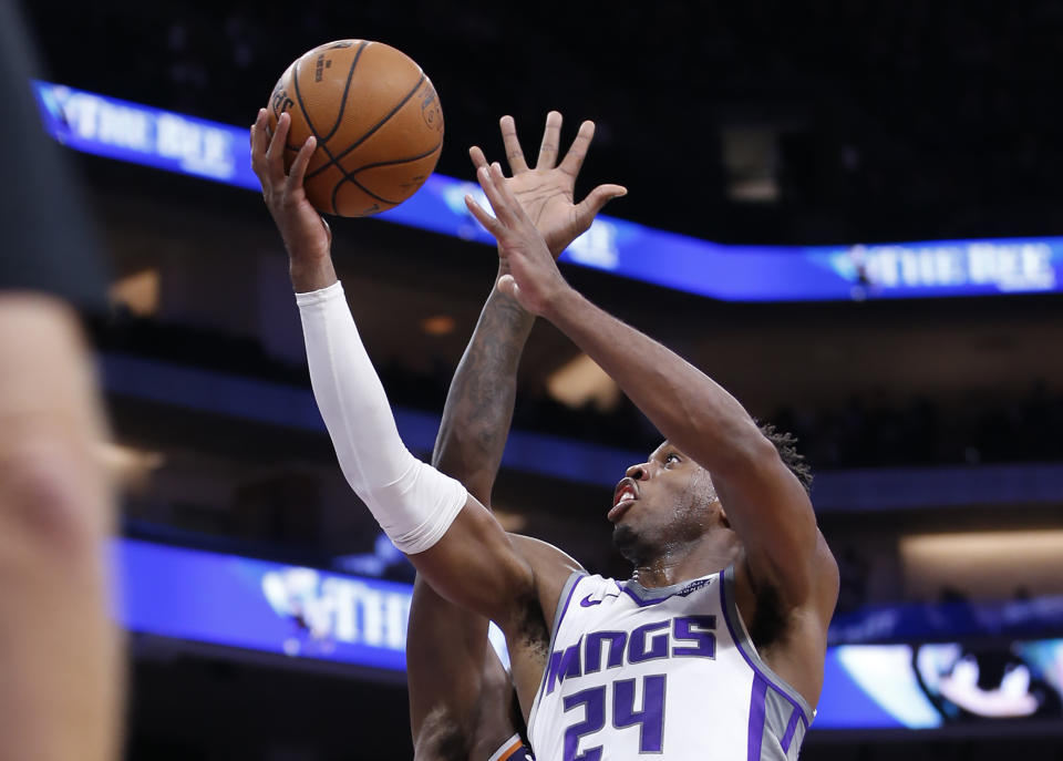 n this photo taken Oct. 10, 2019, Sacramento Kings guard Buddy Hield goes to the basket during the second half of an NBA preseason basketball game against the Phoenix Suns in Sacramento, Calif. Hield, who was acquired when the Kings sent DeMarcus Cousins to the New Orleans Pelicans, led the team in scoring last season averaging 20.7 points per game. (AP Photo/Rich Pedroncelli)