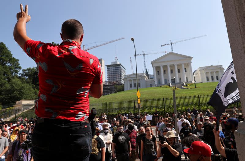 FILE PHOTO: People attend a rally in Richmond