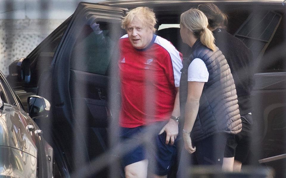 Boris Johnson returns to Downing Street in his running kit -  London News Pictures