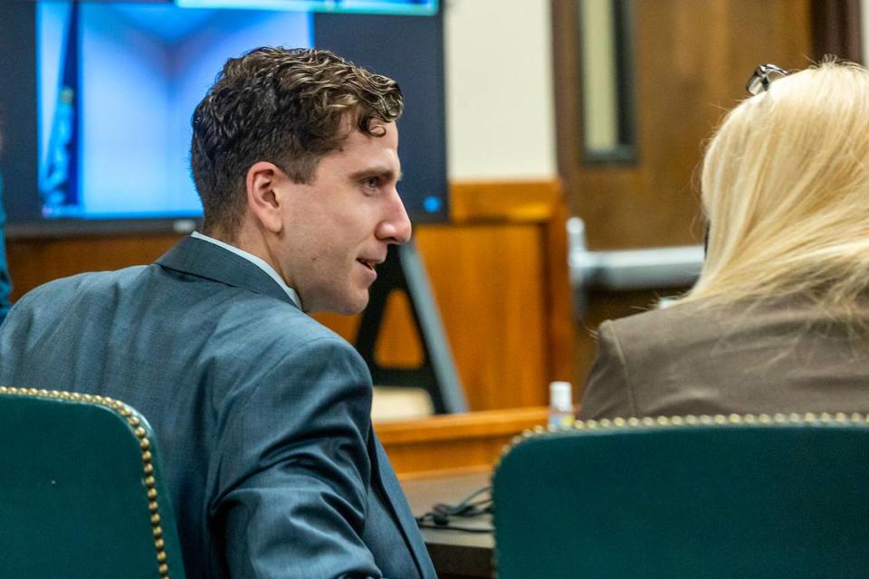 Bryan Kohberger, the man charged with killing four University of Idaho students in November 2022, talks to defense attorney Anne Taylor at his pretrial hearing Friday in Latah County Court. August Frank/August Frank/Tribune