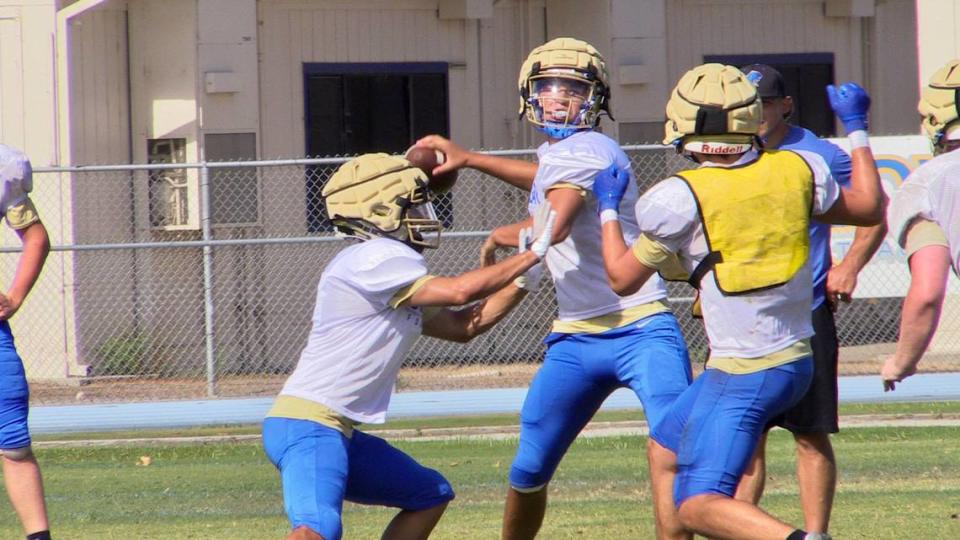 Quarterback Deagan Rose during a Clovis High football practice.