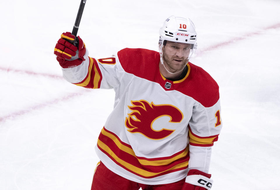 Calgary Flames' Jonathan Huberdeau celebrates after his goal against the Montreal Canadiens during second-period NHL hockey game action in Montreal, Monday, Dec. 12, 2022. (Paul Chiasson/The Canadian Press via AP)