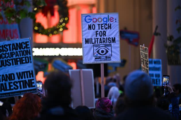 Hundreds of protestors, including Google workers, protest in front of Google's San Francisco offices on Dec. 14, 2023, to demand an end to its work with the Israeli government. Google fired 28 of its employees on April 17, 2024, for protesting inside two Google campuses against Project Nimbus, the company's $1.2 billion contract providing AI services to Israel.