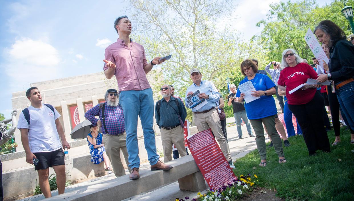 Günther Jikeli, Erna B. Rosenfeld Associate Professor for the Study of Antisemitism, speaks during an anti-Hamas propaganda demonstration at the Showalter Fountain on Thursday, May 2, 2024.