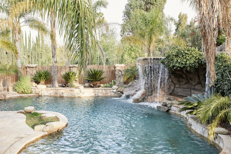 “I love Hawaii. I’m a tropical guy. I came from South America, so I built the pool with the waterfalls, the palm trees, the stones that I was really excited about,” says Valderrama of his dream pool, which was the very first project he embarked upon.