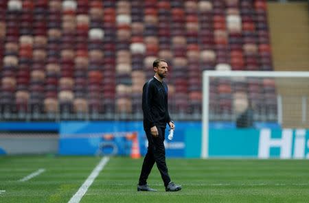 Soccer Football - World Cup - England Press Conference - Luzhniki Stadium, Moscow, Russia - July 10, 2018 England manager Gareth Southgate on the pitch after the press conference REUTERS/Carl Recine