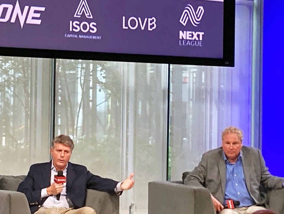 New York Yankees owner Hal Steinbrenner, left, speaks as team president Randy Levine listens during the Sportico Invest in Sports Conference, Wednesday, Oct. 11, 2023, in New York. (AP Photo/Ronald Blum)