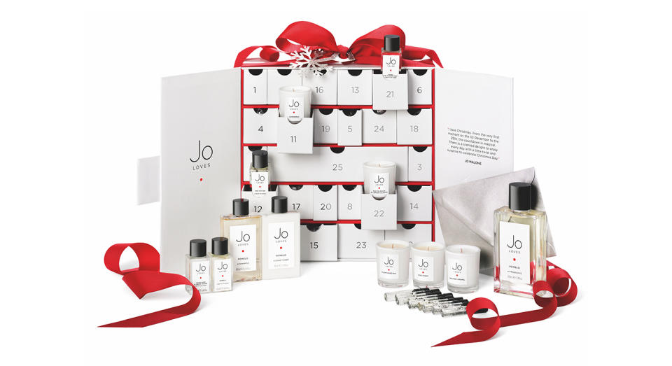 <p>Perfume fanatics, we’ve found just the one for you. Priced at £250, the first beauty advent calendar from Jo Loves (a spin-off brand from Jo Malone) features 24 minature goodies. On Christmas Day, you can even trade in a token for your favourite 100ml scent. Merry Christmas! Available <a rel="nofollow noopener" href="https://www.joloves.com/" target="_blank" data-ylk="slk:online;elm:context_link;itc:0;sec:content-canvas" class="link ">online</a> and in store from November 5. </p>