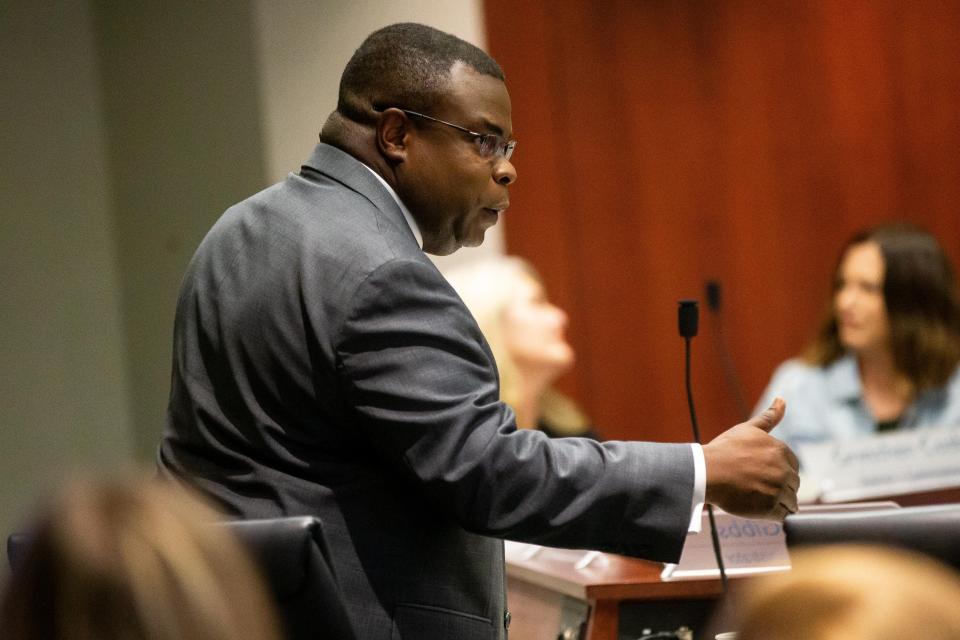 Administrator John Gibbs speaks with corporate counsel before a meeting Tuesday, Sept. 26, 2023, in West Olive.