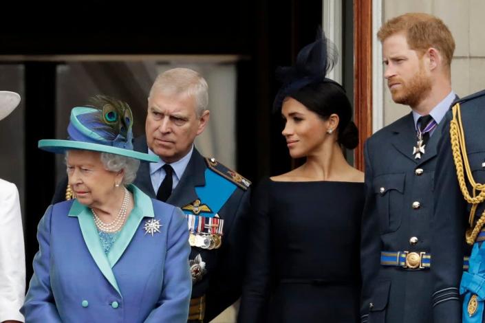 Harry and Meghan with the Queen and Prince Andrew on the Buckingham Palace balcony in 2018 for an RAF flyover (AP)