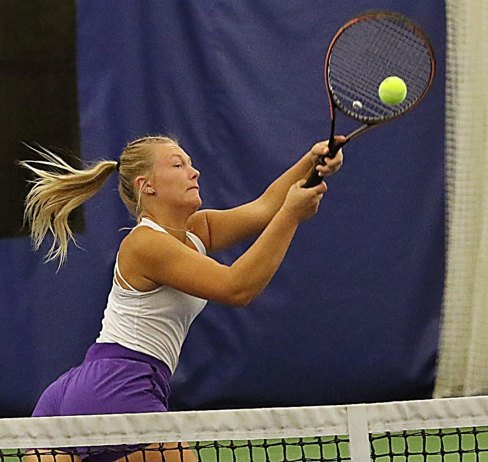 Watertown's Karlie Schulte slams the ball at the net during a third-flight doubles match in the South Dakota state Class AA high school girls tennis tournament on Friday, Oct. 6, 2023 in Sioux Falls.