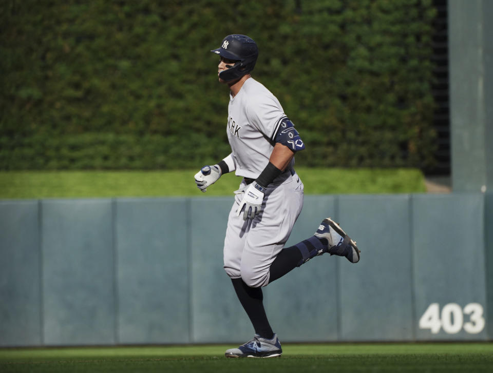 New York Yankees' Aaron Judge runs the bases on a two-run home run off Minnesota Twins pitcher Cole Sands during the first inning of a baseball game Tuesday, June 7, 2022, in Minneapolis. (AP Photo/Jim Mone)