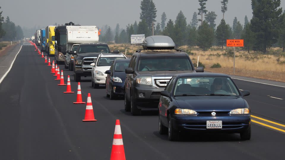 A long line of traffic near La Pine, Oregon, in 2017 gives an idea of what people on the move could face this year. - Robyn Beck/AFP/Getty Images