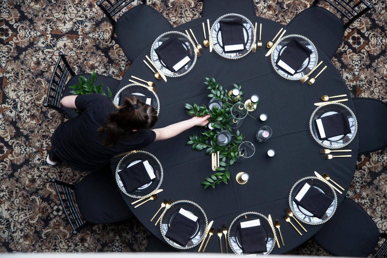 Staff set up for a wedding reception at the atrium at the Saint John's Resort in Plymouth on Jan. 28, 2023.