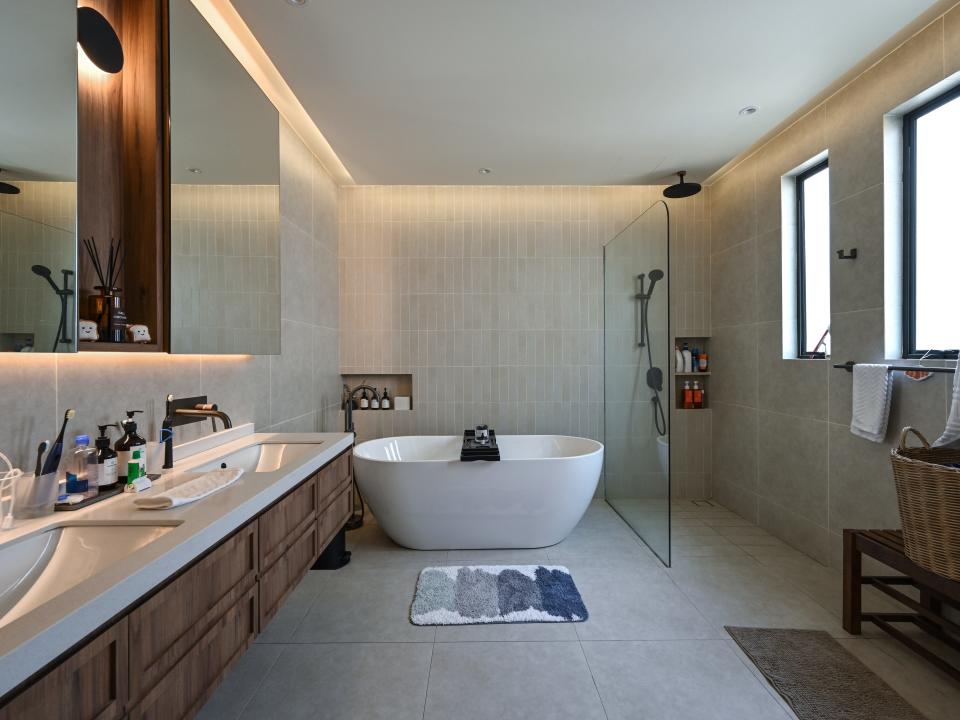 A freestanding tub is the focal point of the master bathroom.