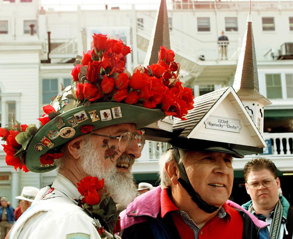 Col. Charles Matasich (left) and George Holter (right), wearing two of the most photographed hats at the 1997 Kentucky Derby.